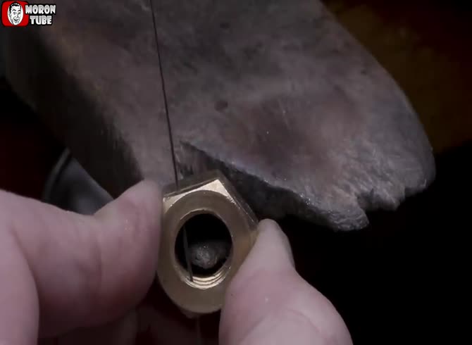Video :A skilled jeweler creates a diamond-studded ring out of two common nuts